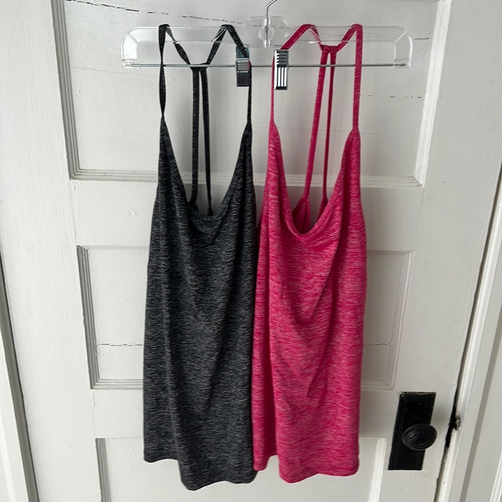 Two Nike dri-fit tank tops (pink and gray)